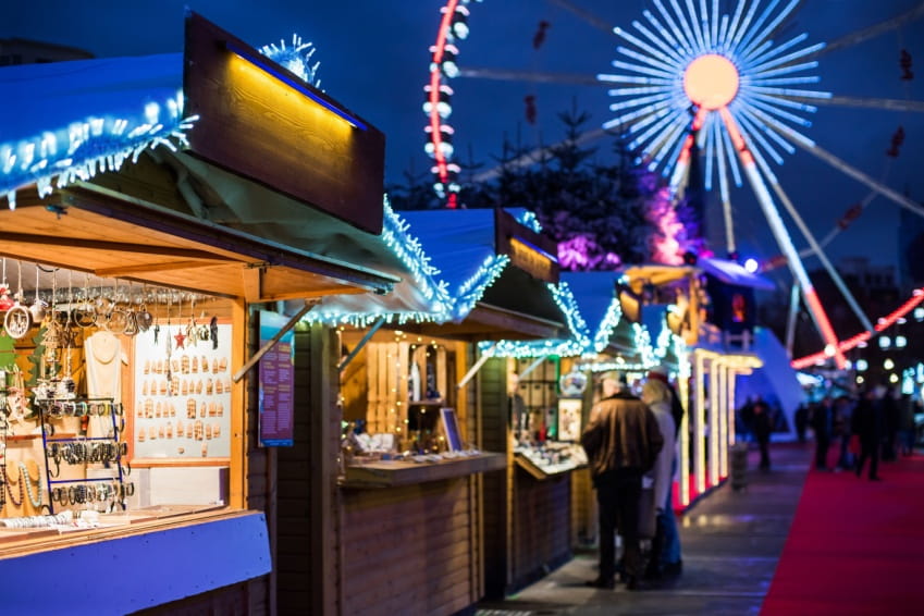 Traditional Christmas market in Europe, Brussels, Belgium. Main town square with decorated tree and lights. Christmas fair concept