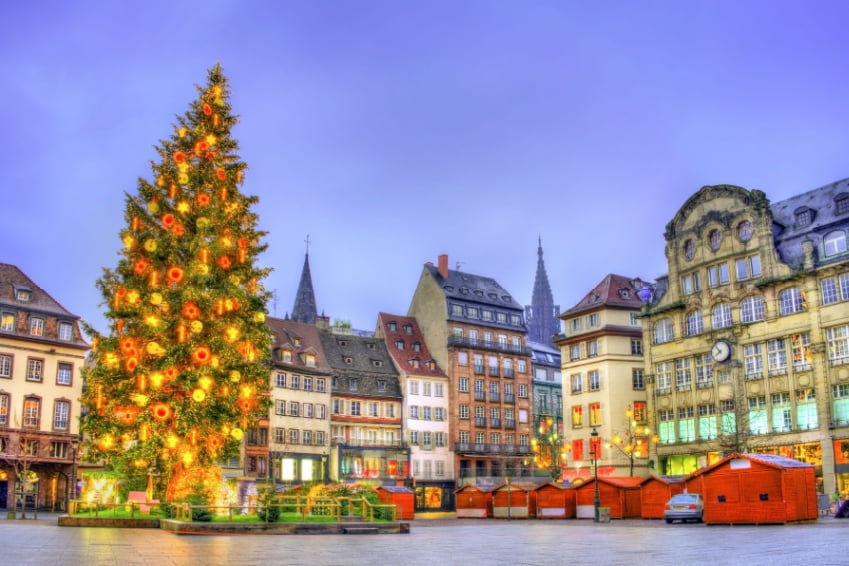 Christmas tree at the famous Christmas Market in Strasbourg at night - Alsace, France