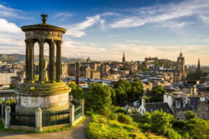 Panoramic aerial view of Edinburgh castle from Calton Hill in a beautiful summer evening in Scotland,
