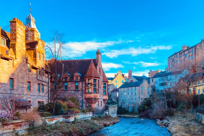 Dean Village and its river in Edinburgh's charming New Town, part of the UNESCO World Heritage Site and one of the most important facts about Edinburgh.
