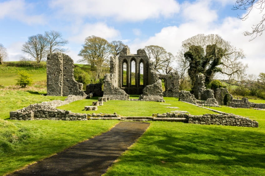 Ruins of Inch Abbey, a large monastic site near Downpatrick on the north bank of the River Quoile.